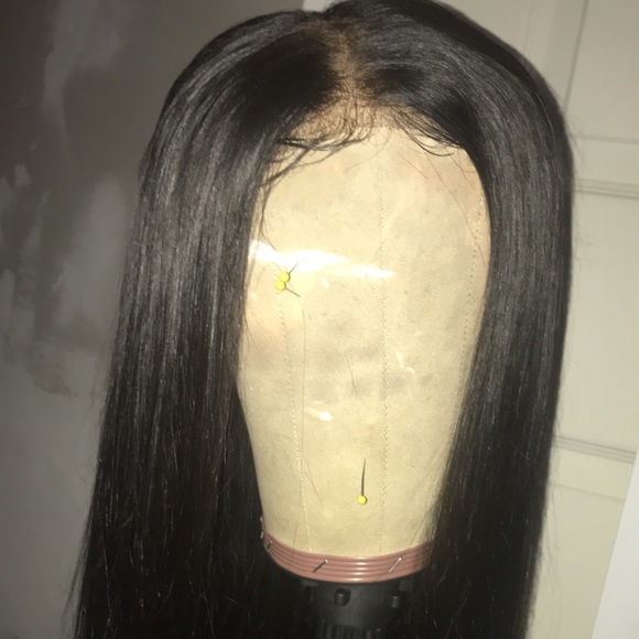 Brazilian Hair Unit. 20in Closure, 3 22in bundles.